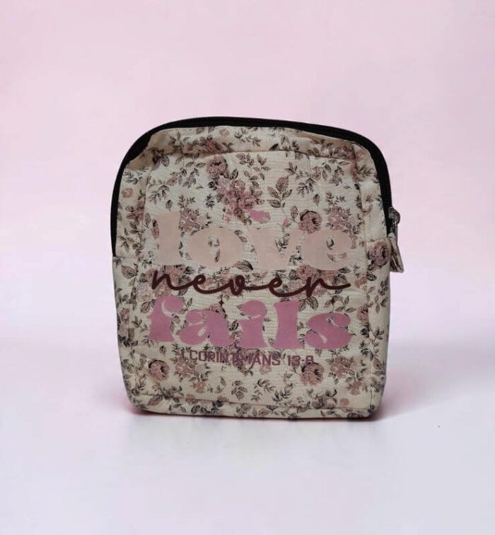 Love Never Fails Small Hand Purse With Bible Verse - Image 1